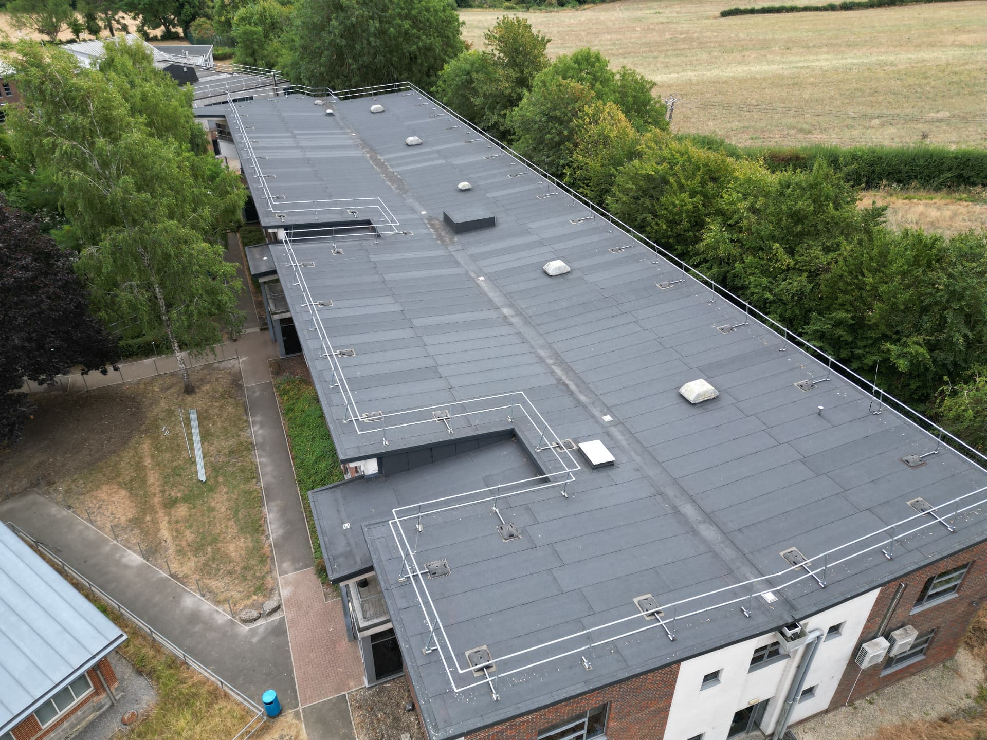Third flat roof area completed with new outlets and upstand detailing, Kingsbury Green Academy