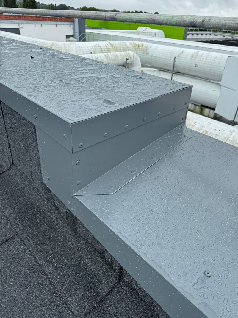 Capping & Flashings Refurbishment flat roofing system installed by TRS on a UK commercial building