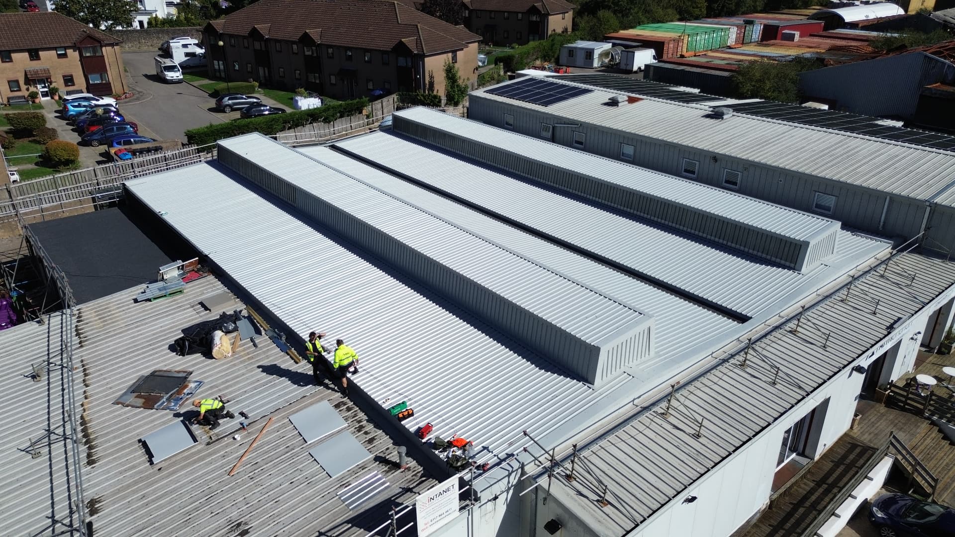 Aerial overview of the completed metal overclad roof at Faith Church, Newport