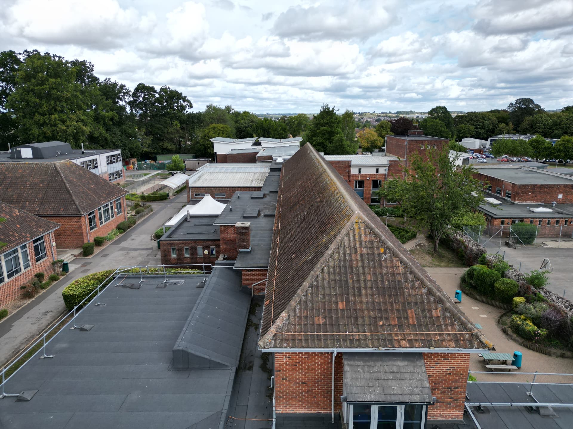 Side elevation showing high-pitch roof before replacement, Kingsbury Green Academy