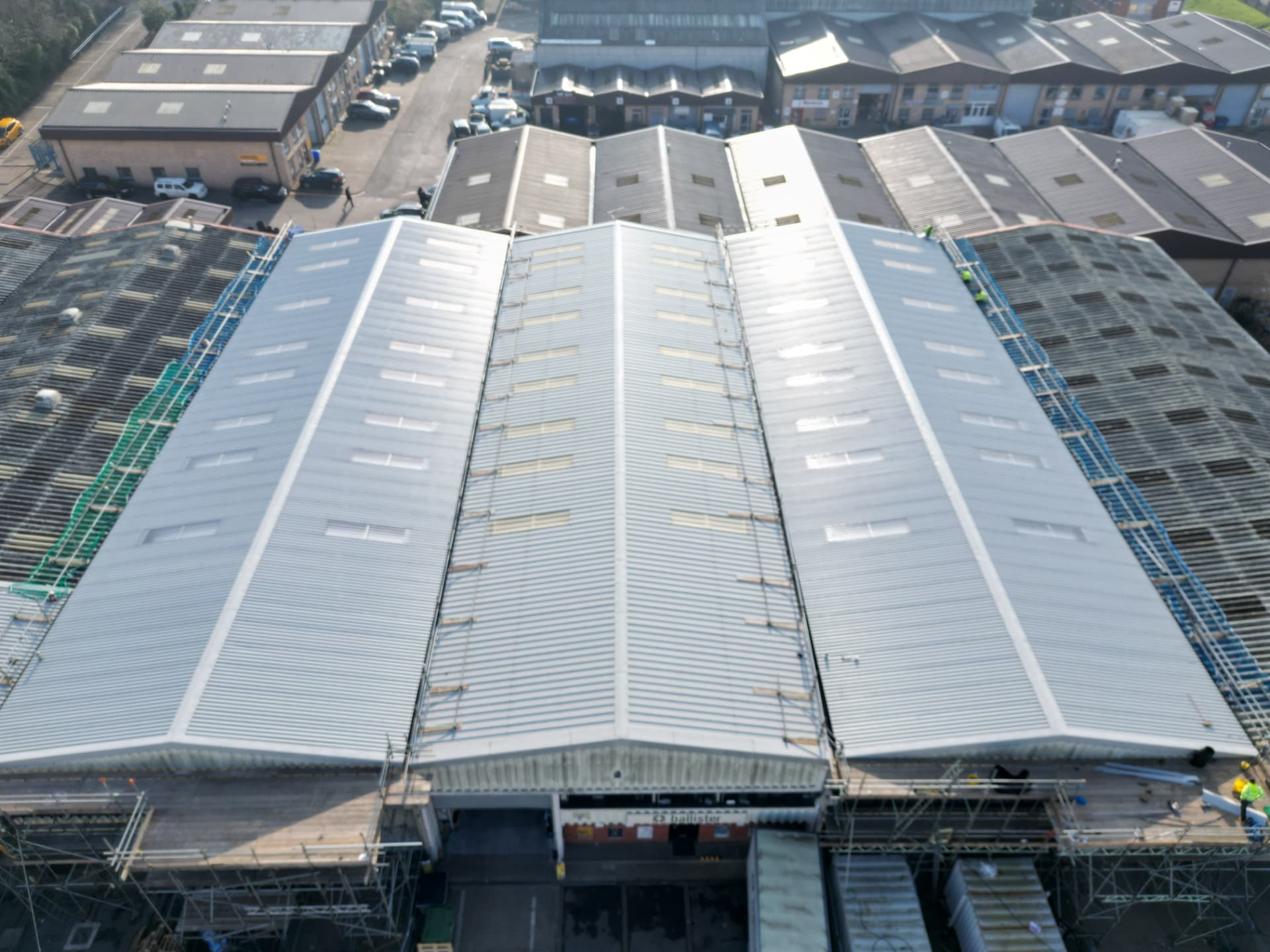 Aerial view of a completed profiled metal roof refurbishment on an industrial unit