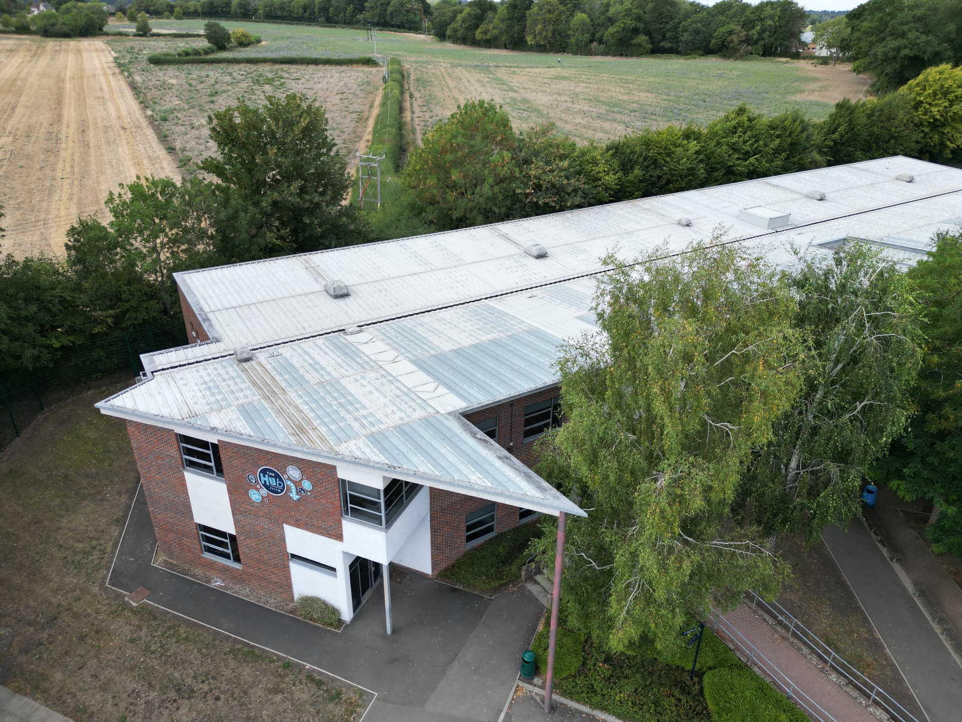 Weathered flat roof area before refurbishment at Kingsbury Green Academy