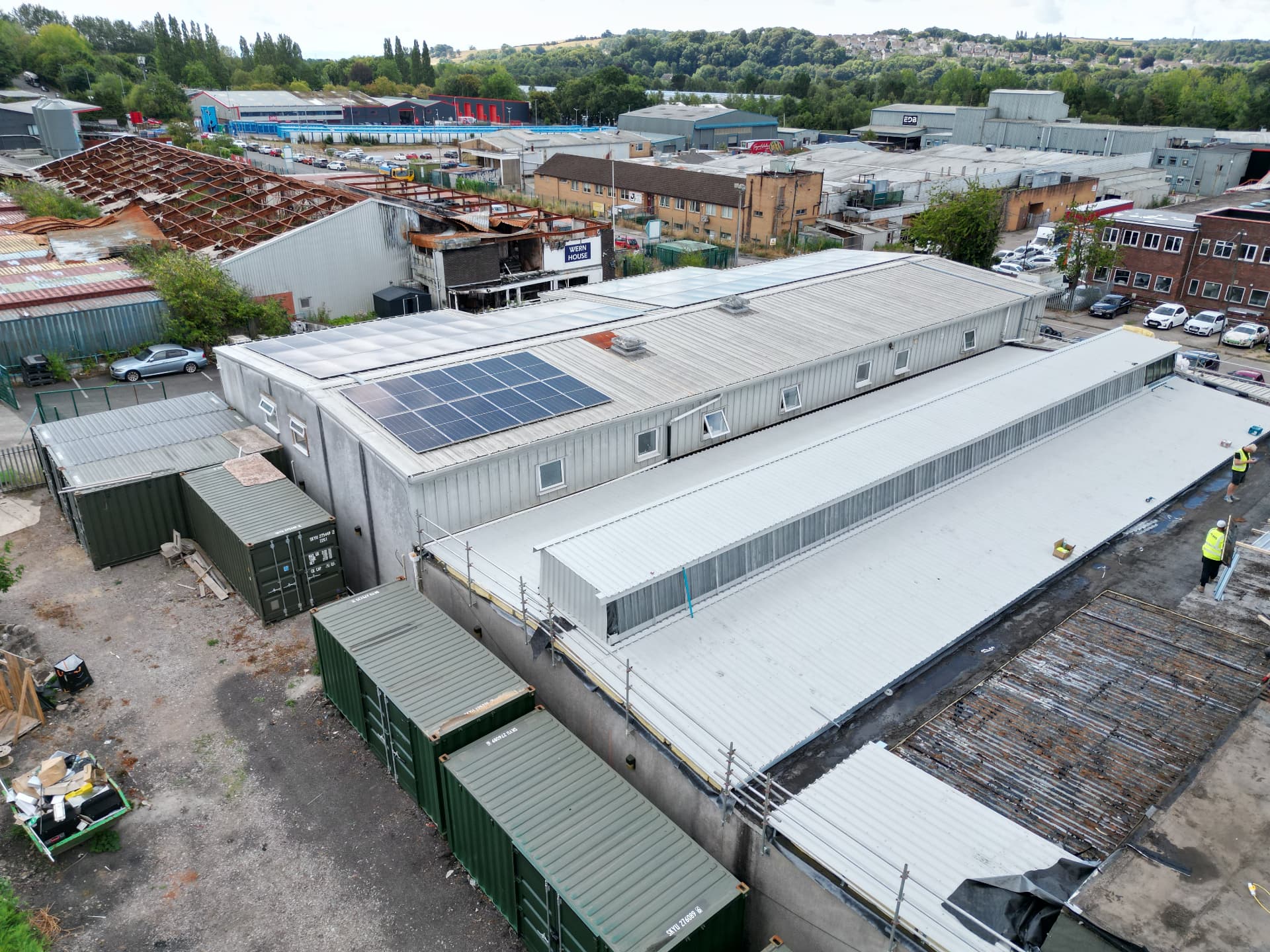 Aerial view of the new light grey metal roof and surrounding site at Faith Church, Newport