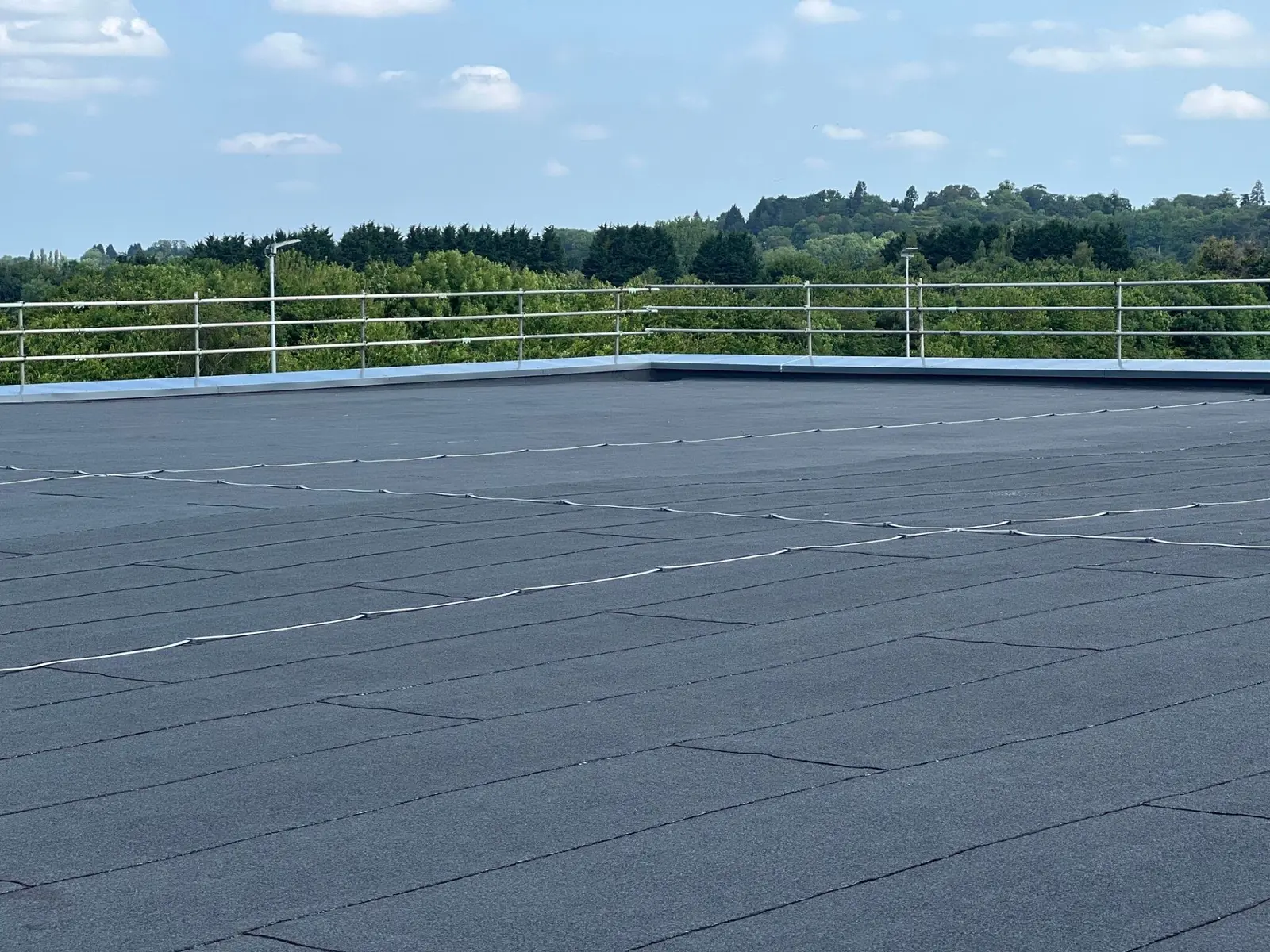 Insulated Bituminous Membrane Refurbishment flat roofing system installed by TRS on a UK commercial building