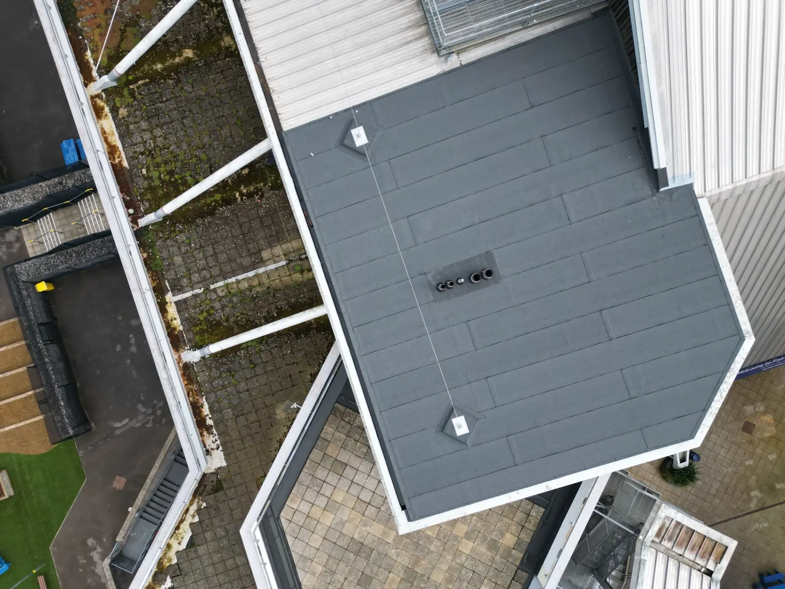 Flat roof refurbishment on a commercial office and retail building