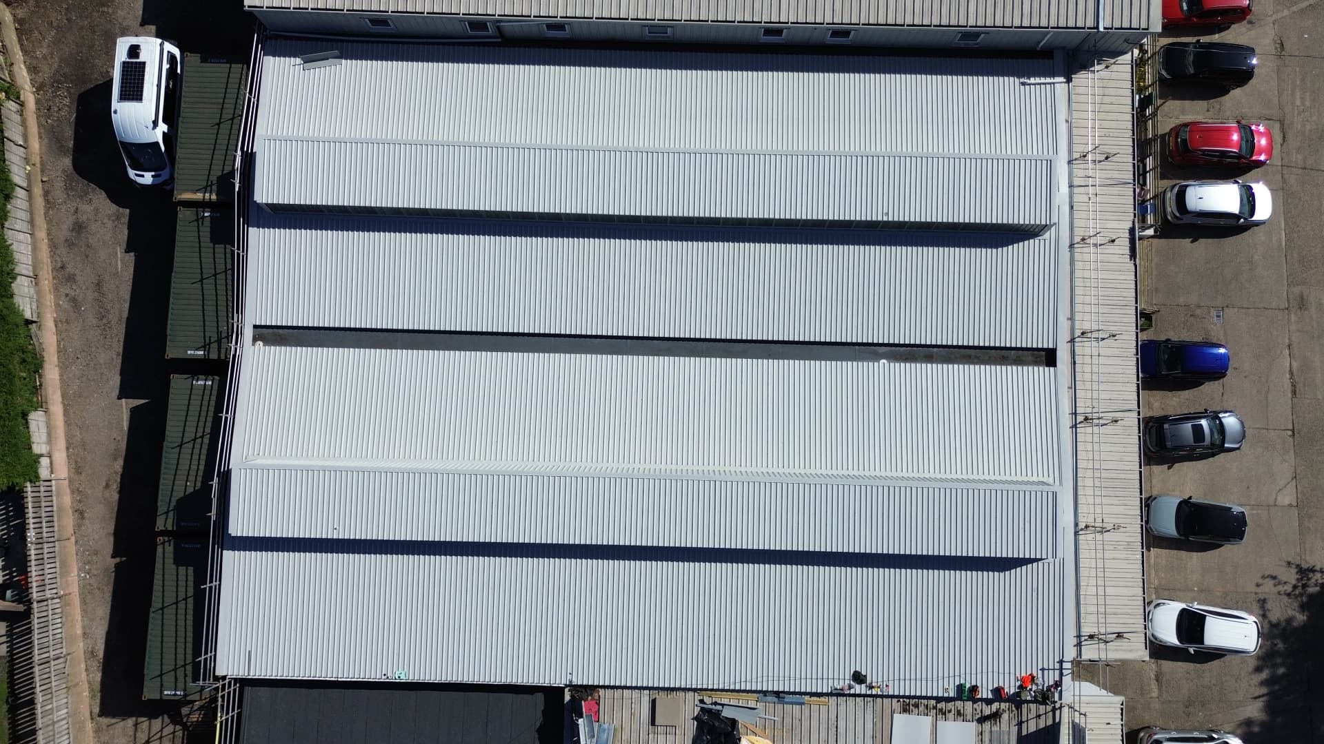 Overhead aerial of the finished roof at Faith Church Newport – Metal Roof Overclad and Thermal Upgrade, Newport